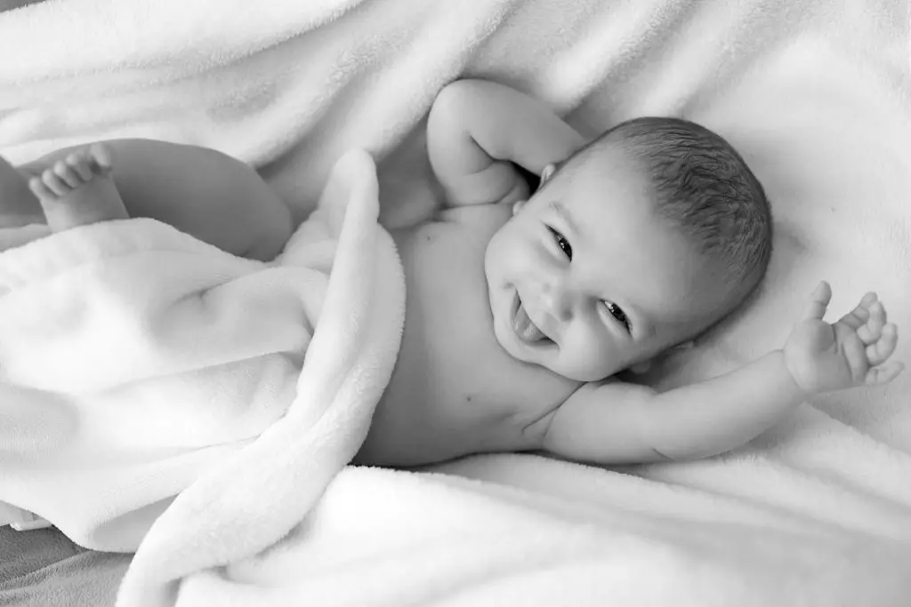 Perfect Three Syllable Boy Names with Meanings 8 Baby in a blanket