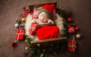 New born baby in red costume