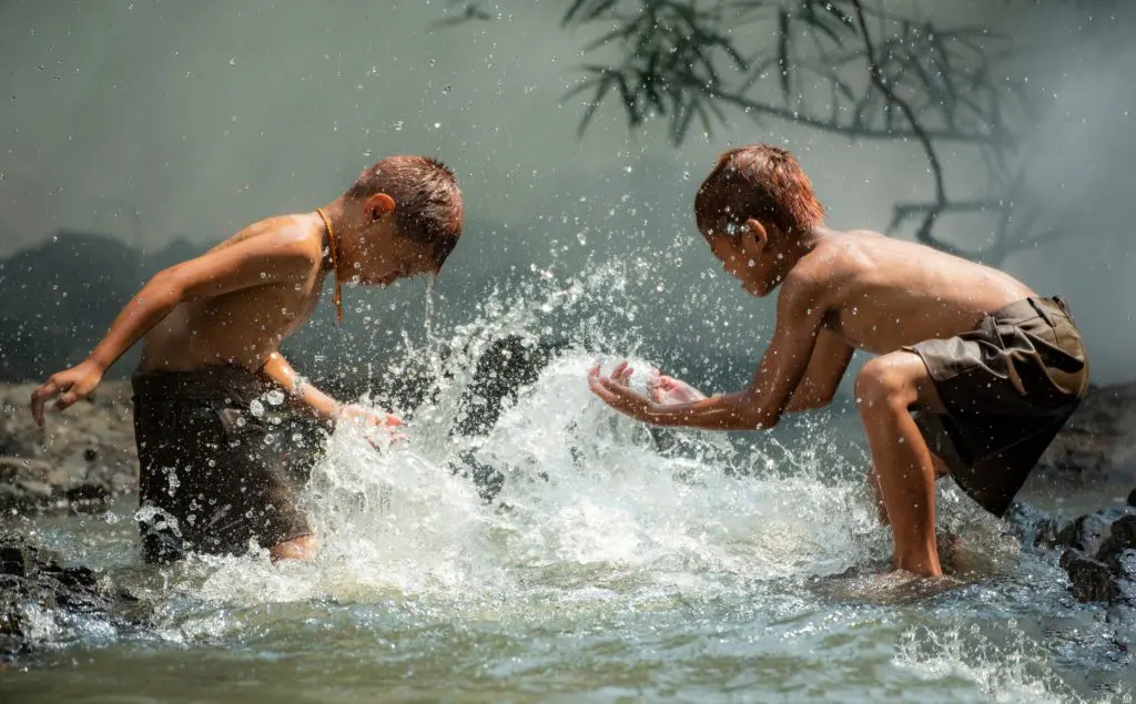 Kids playing in the river