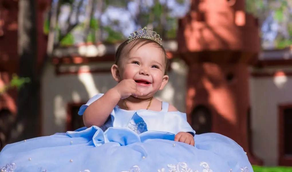 Baby Girl Wearing a Gown - Featured