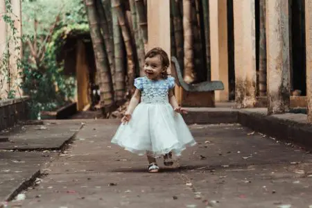 Girl Walking On Pathway - Featured