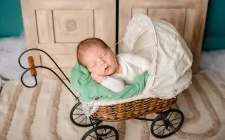 Baby Sleeping in Stroller - Featured
