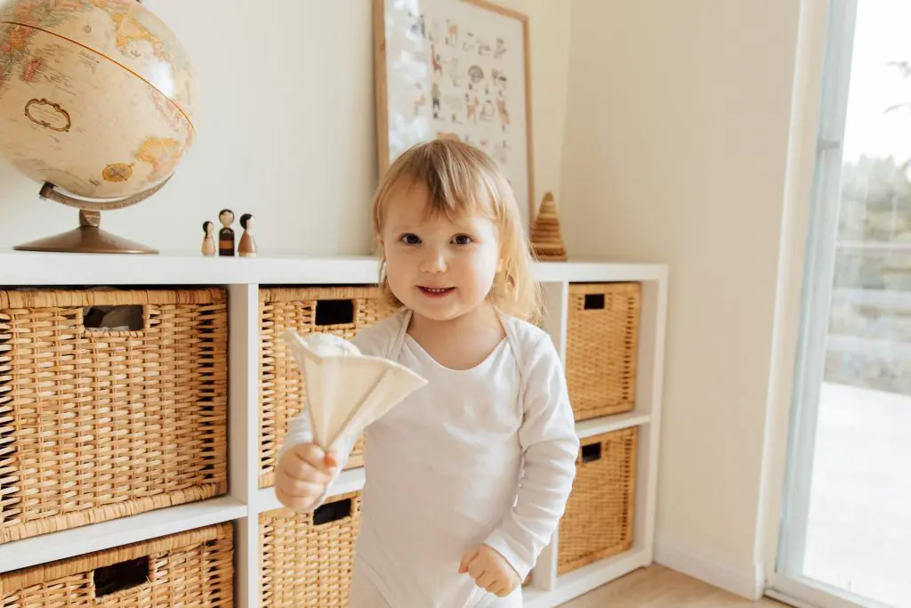 100+ Unique Girl Names That Start With G 4 Cute little girl playing with toy
