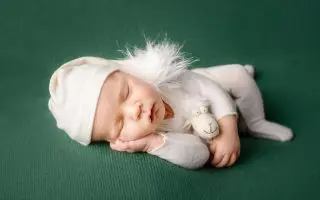 Little Baby on Green Background - Featured