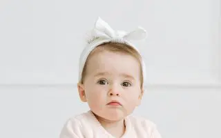 New born child with a Cute Headband