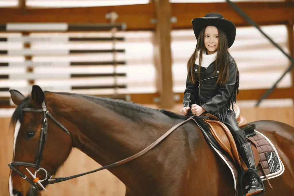 100 Beautiful Southern Girl Names 3 Little Girl Horseback Riding and Smiling