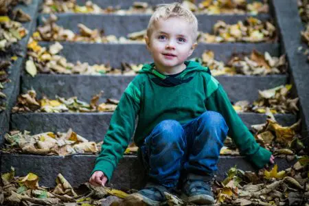 Boy Sitting On Stairs - Featured
