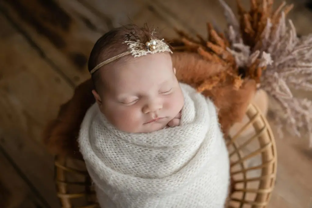 300 Unusual Girl Names that are Beautiful and Meaningful 9 Sleeping Newborn in a Wicker Basket