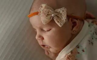 Sleeping Baby with Lace Bow Headband