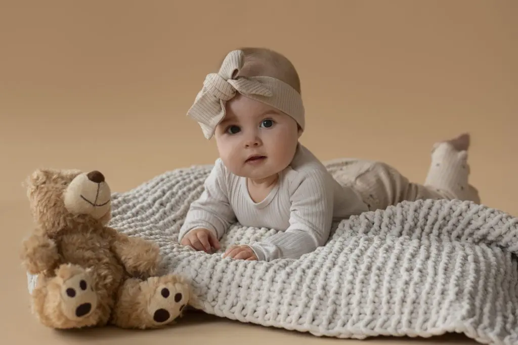 Cute baby with stuffed animal