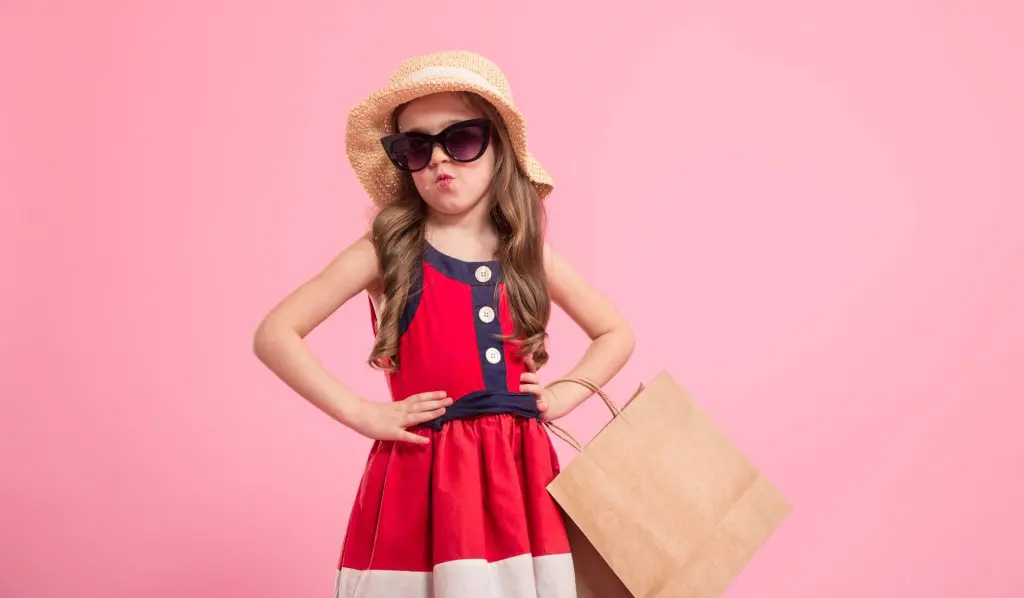 little fashionista with a shopping bag