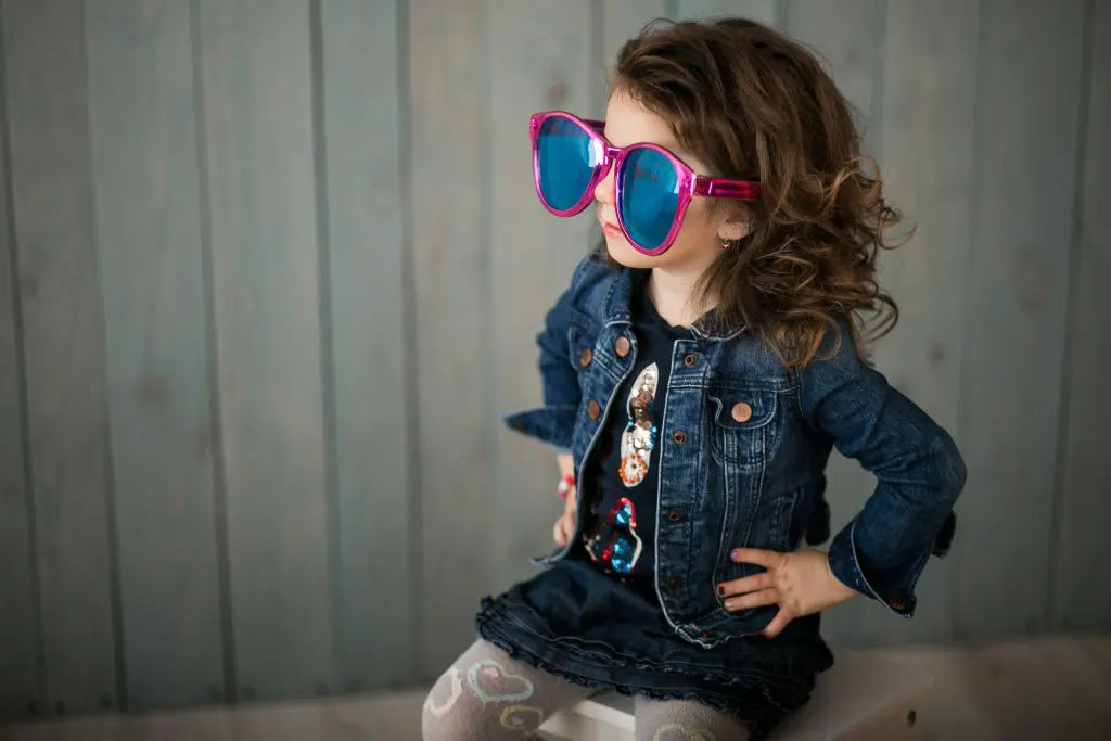 Little girl in big sunglasses