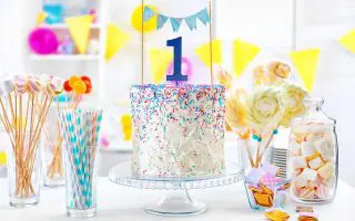 Tasty cake with sprinkles on First Birthday of Baby Boy