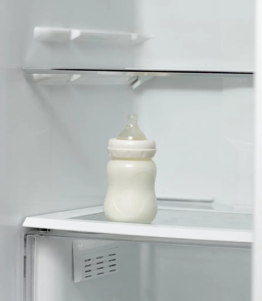 Baby Bottle on a shelf in the refrigerator