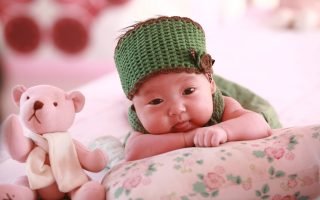 Baby with a teddy bear