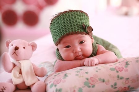 Baby with a teddy bear