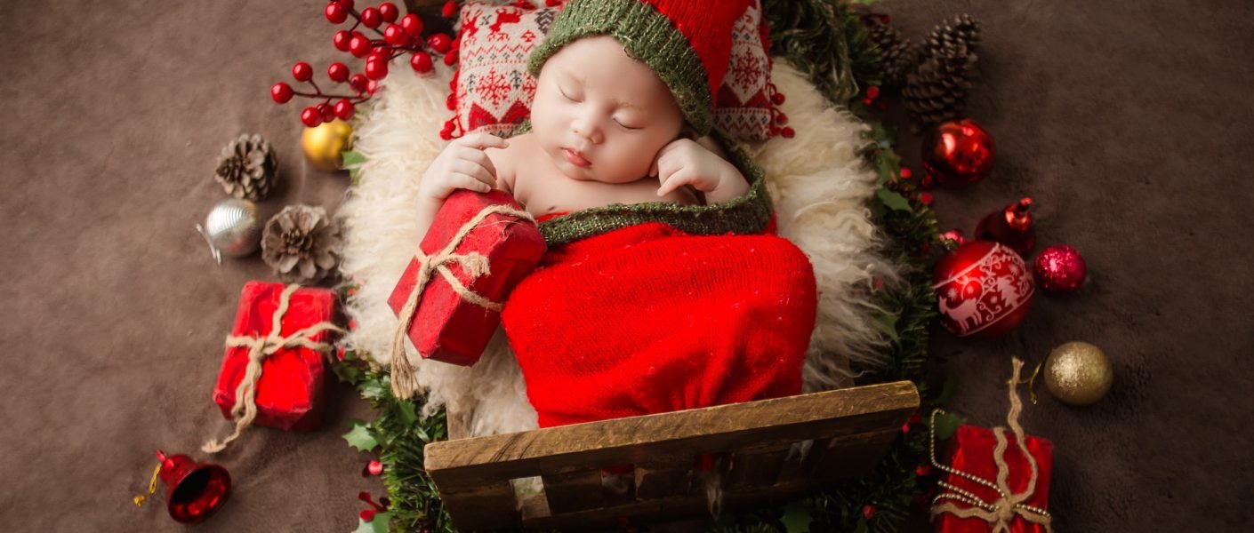 New born baby in red costume