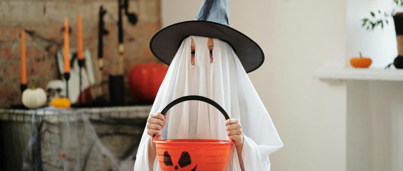 Child in a Ghost Costume - Featured