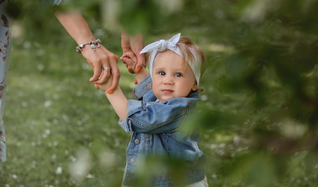 Cute Baby with Her Parent - Featured