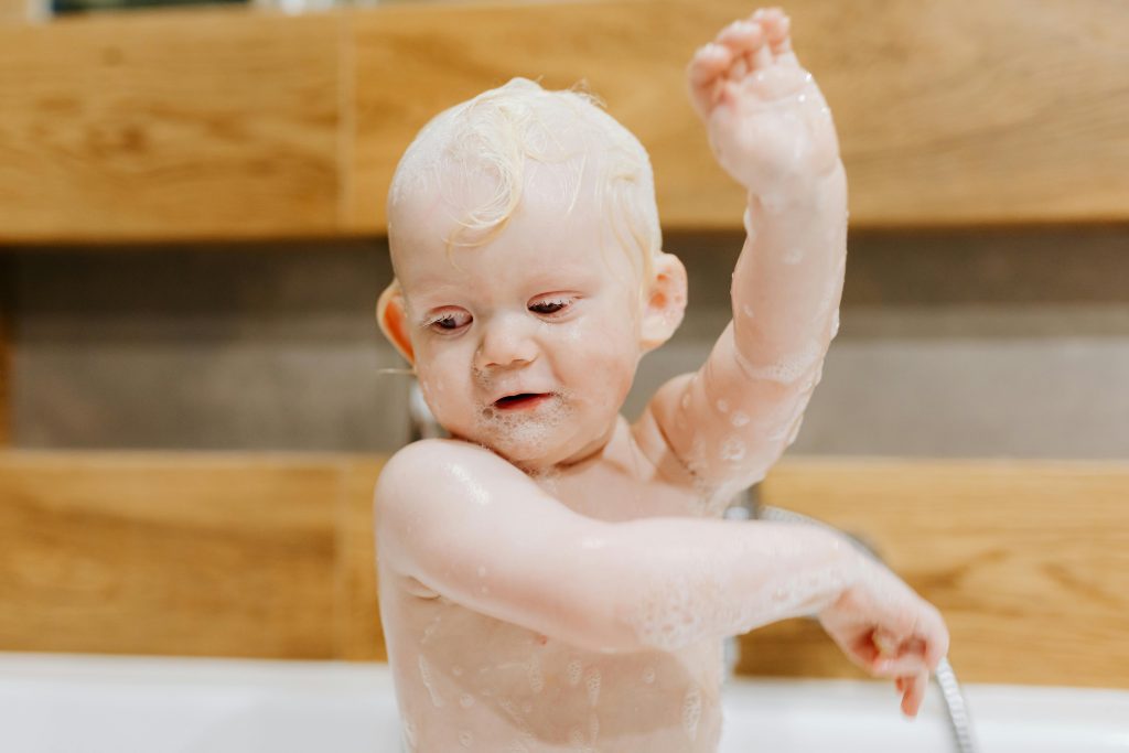 Cute Baby Taking a Bath
