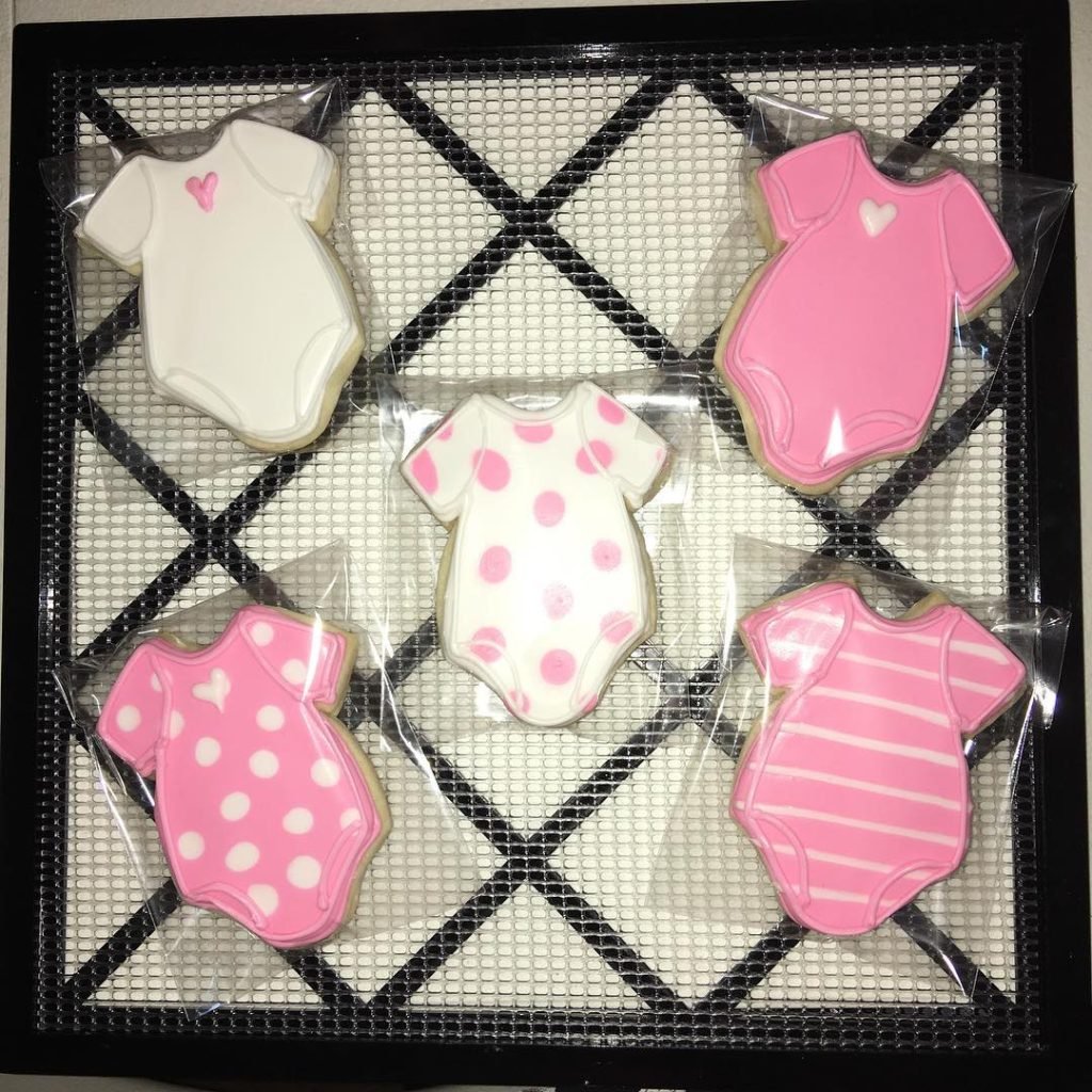 25 Baby Shower Cookie Ideas for Girls That Are Too Pretty to Eat 14 Classic Onesies Baby Shower Cookies For Girls
