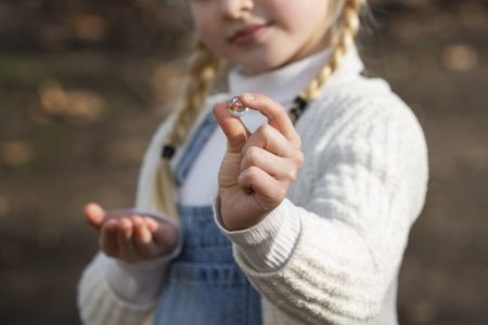 Girl holding stone