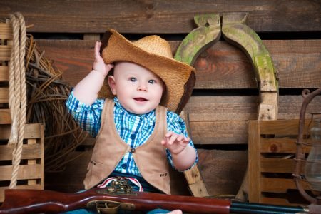 25 Rustic Cowboy On The Way Baby Shower Theme Ideas 4 Small boy in cowboy decor