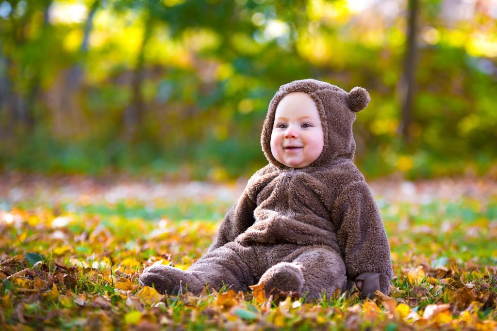 100 Modern Boy Names With Cool Nicknames 12 Smiling boy in autumn