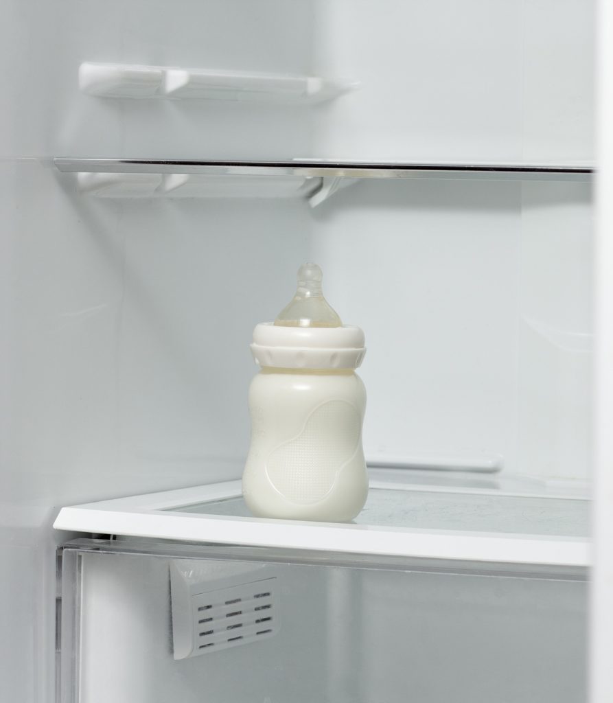 Baby Bottle on a shelf in the refrigerator